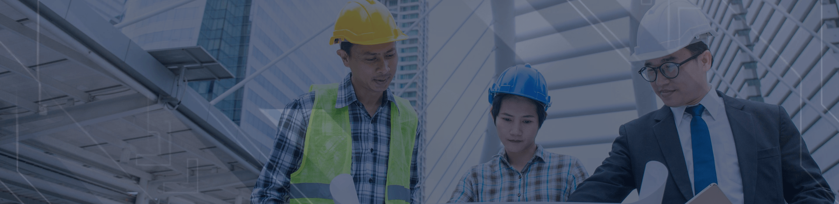 Engineers discussing building plans